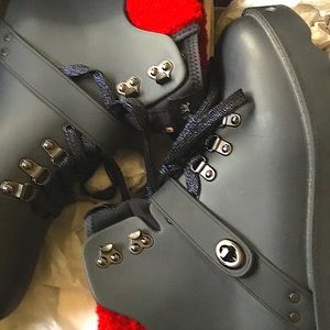 New coach winter boots navy and red in box with tags and receipt box is damaged